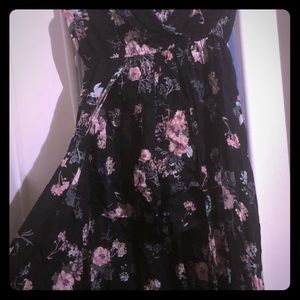 Black/flower print romper with skirt attached